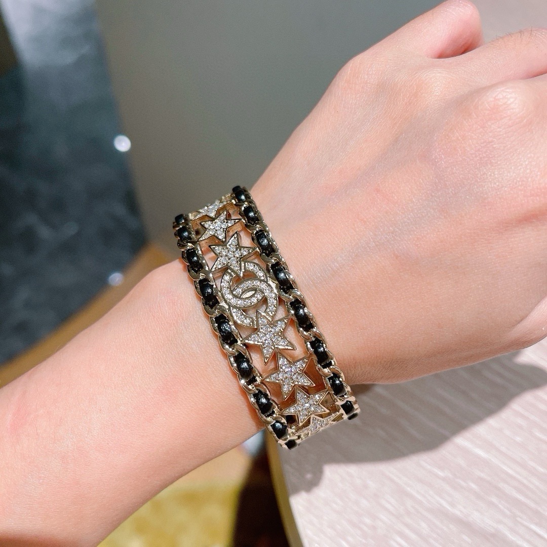 Chanel CC Star Crystal Chain Cuff bracelet Gold-tone metal black leather clear crystal One Size Open