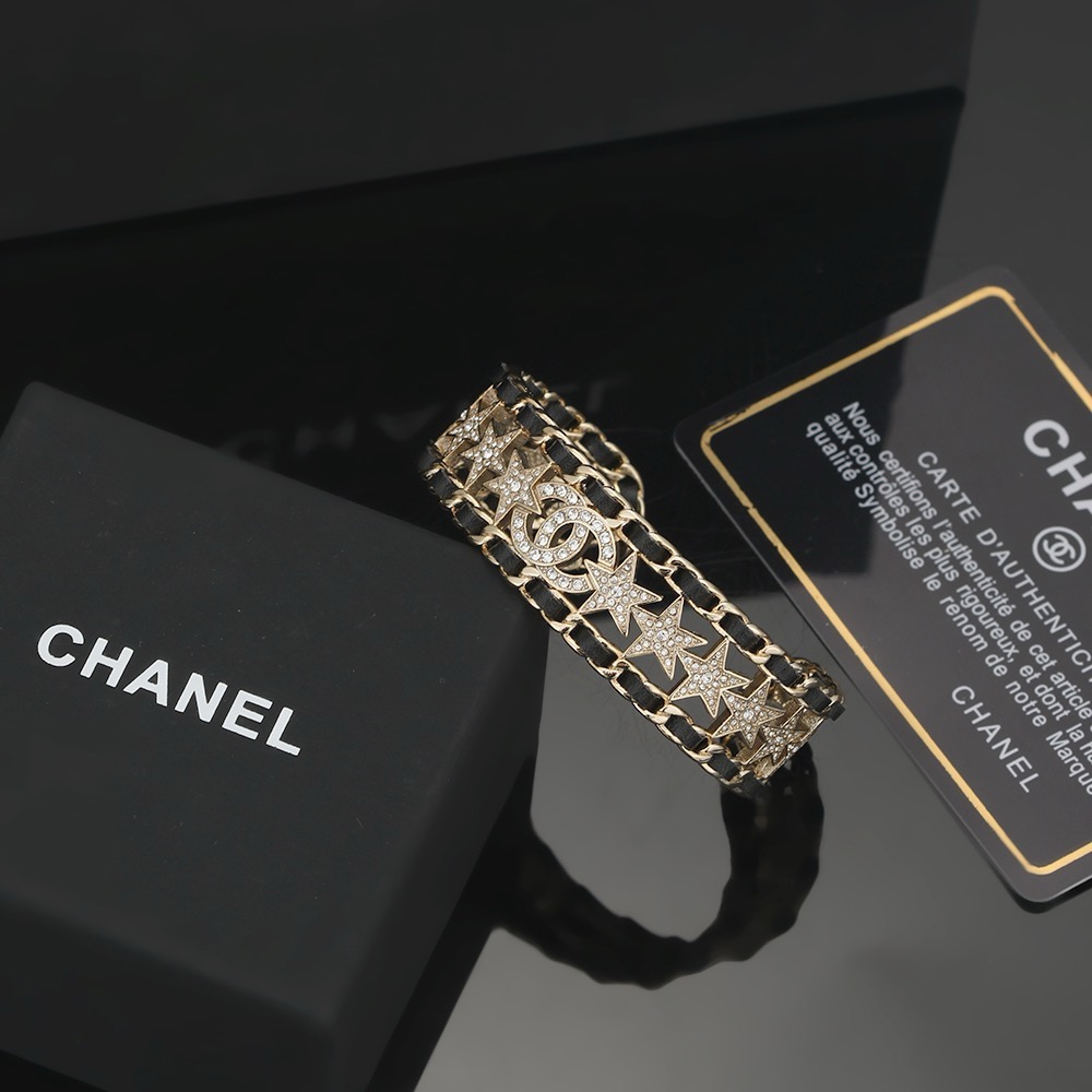 Chanel CC Star Crystal Chain Cuff bracelet Gold-tone metal black leather clear crystal One Size Open
