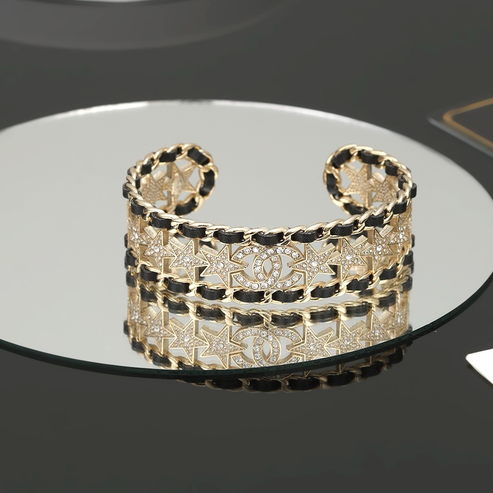 Chanel CC Star Crystal Chain Cuff bracelet Gold-tone metal black leather clear crystal One Size Open
