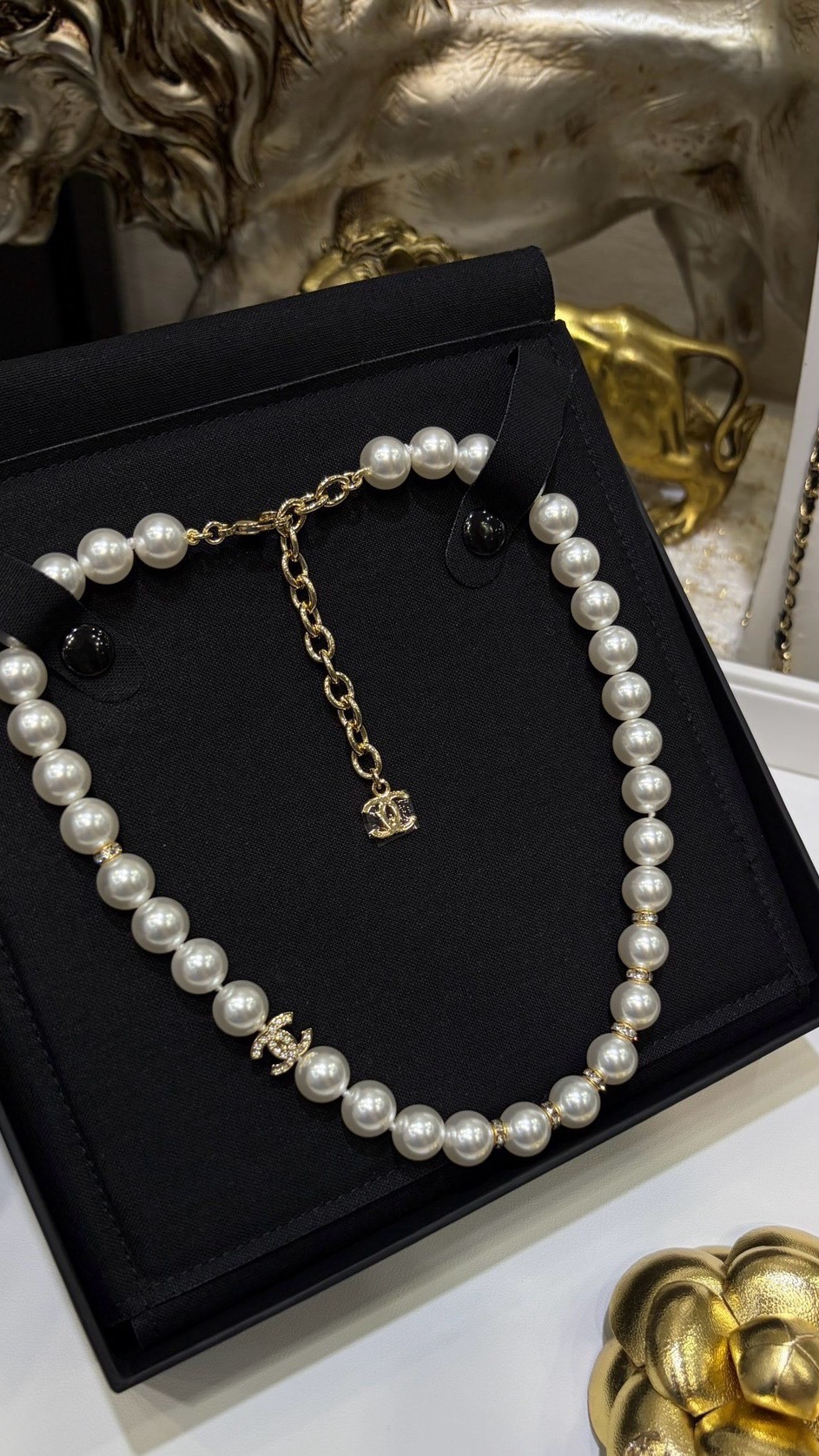 Chanel CC Pearl Crystal bracelet Gold-tone metal cream white faux pearl clear crystal 18cm