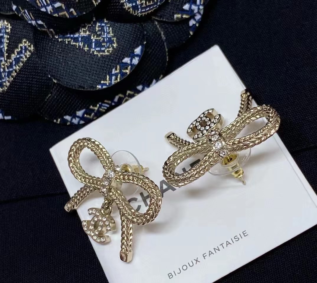 Chanel CC Logo Bow Drop Earrings earrings Light gold-tone metal with clear crystal accents One Size