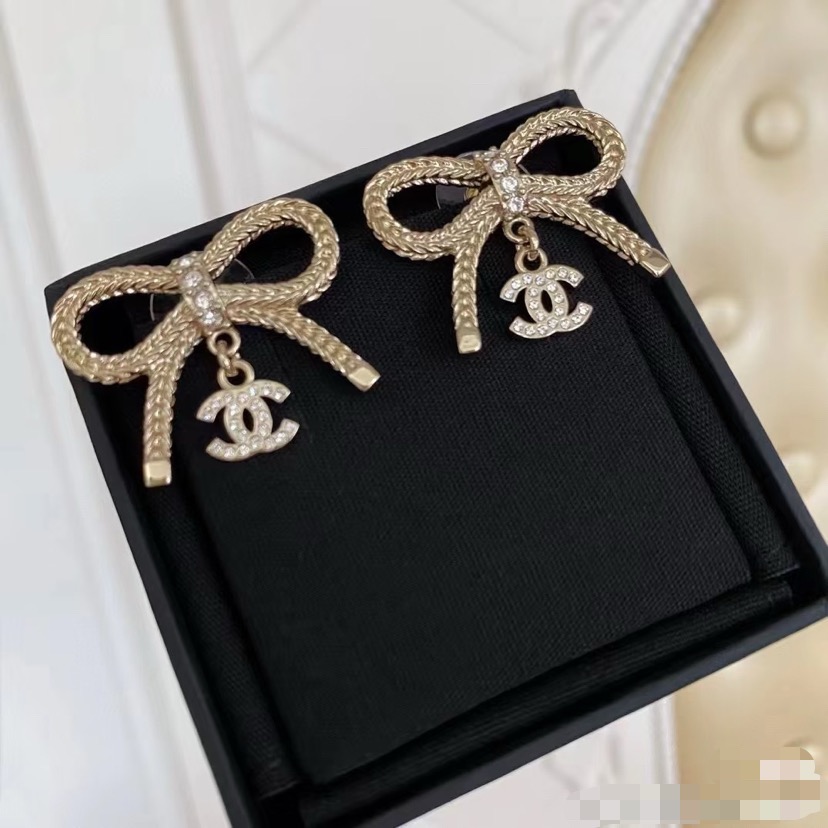 Chanel CC Logo Bow Drop Earrings earrings Light gold-tone metal with clear crystal accents One Size