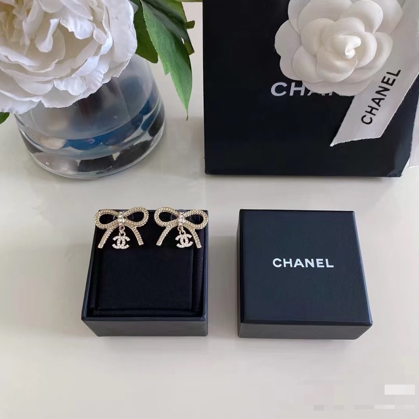 Chanel CC Logo Bow Drop Earrings earrings Light gold-tone metal with clear crystal accents One Size