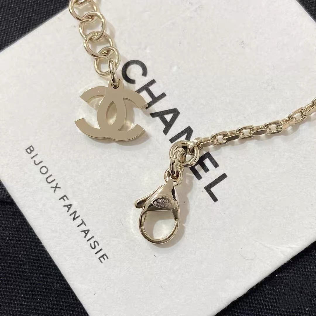 Chanel Crystal Bow CC Pearl Necklace necklace Light gold tone metal white faux pearls clear crystals 42cm with 5cm extender