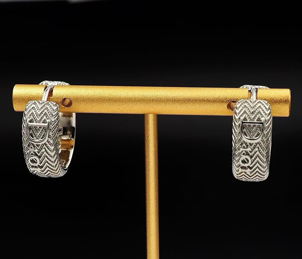 Dior CD Icon Chevron Hoop Earrings earrings Gold-tone metal with chevron embossed detailing and CD logo accents Silver-tone metal with chevron embossed detailing and CD logo accents 1 5cm hoop diameter