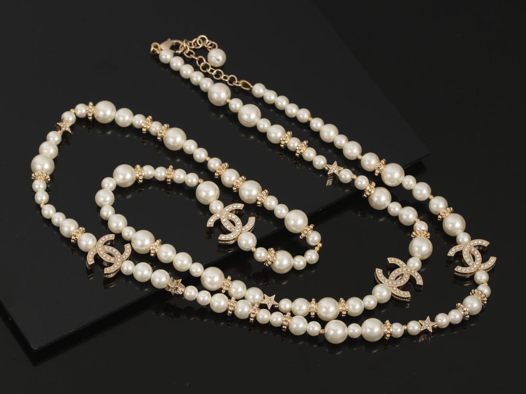Chanel CC Logo Multi-Charm Pearl Long Necklace necklace Gold-tone metal cream white faux pearl clear crystal 80cm with 5cm extender chain