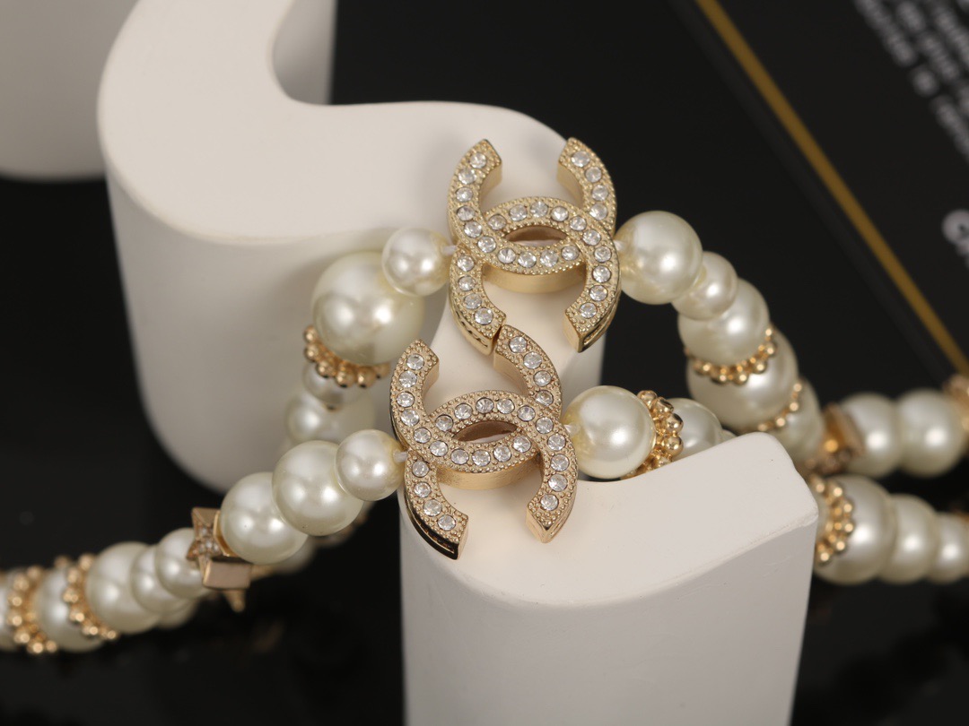 Chanel CC Logo Multi-Charm Pearl Long Necklace necklace Gold-tone metal cream white faux pearl clear crystal 80cm with 5cm extender chain