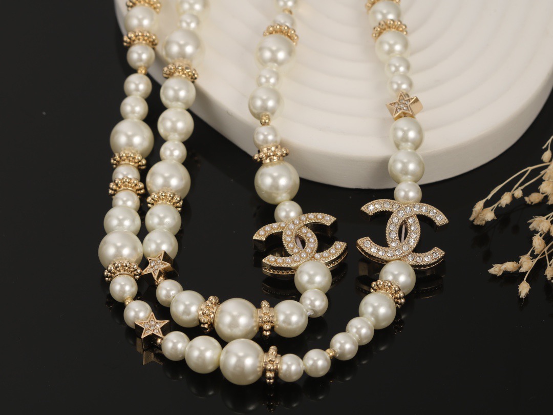 Chanel CC Logo Multi-Charm Pearl Long Necklace necklace Gold-tone metal cream white faux pearl clear crystal 80cm with 5cm extender chain