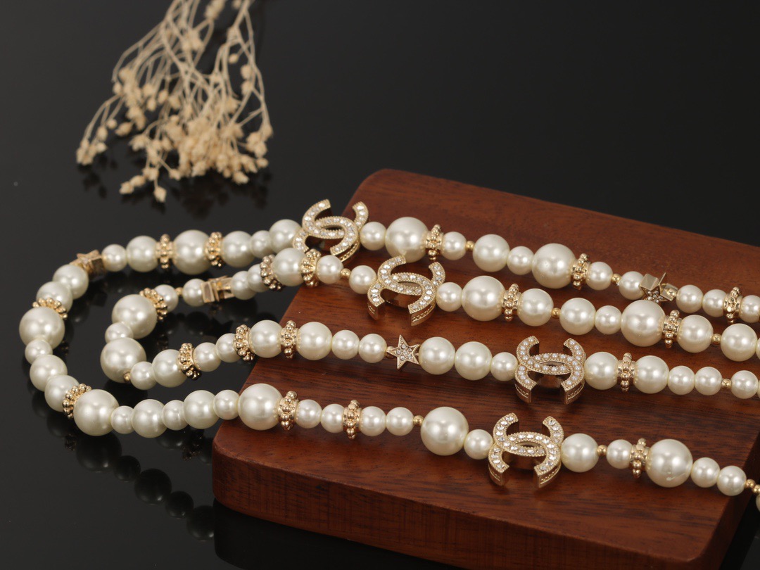 Chanel CC Logo Multi-Charm Pearl Long Necklace necklace Gold-tone metal cream white faux pearl clear crystal 80cm with 5cm extender chain