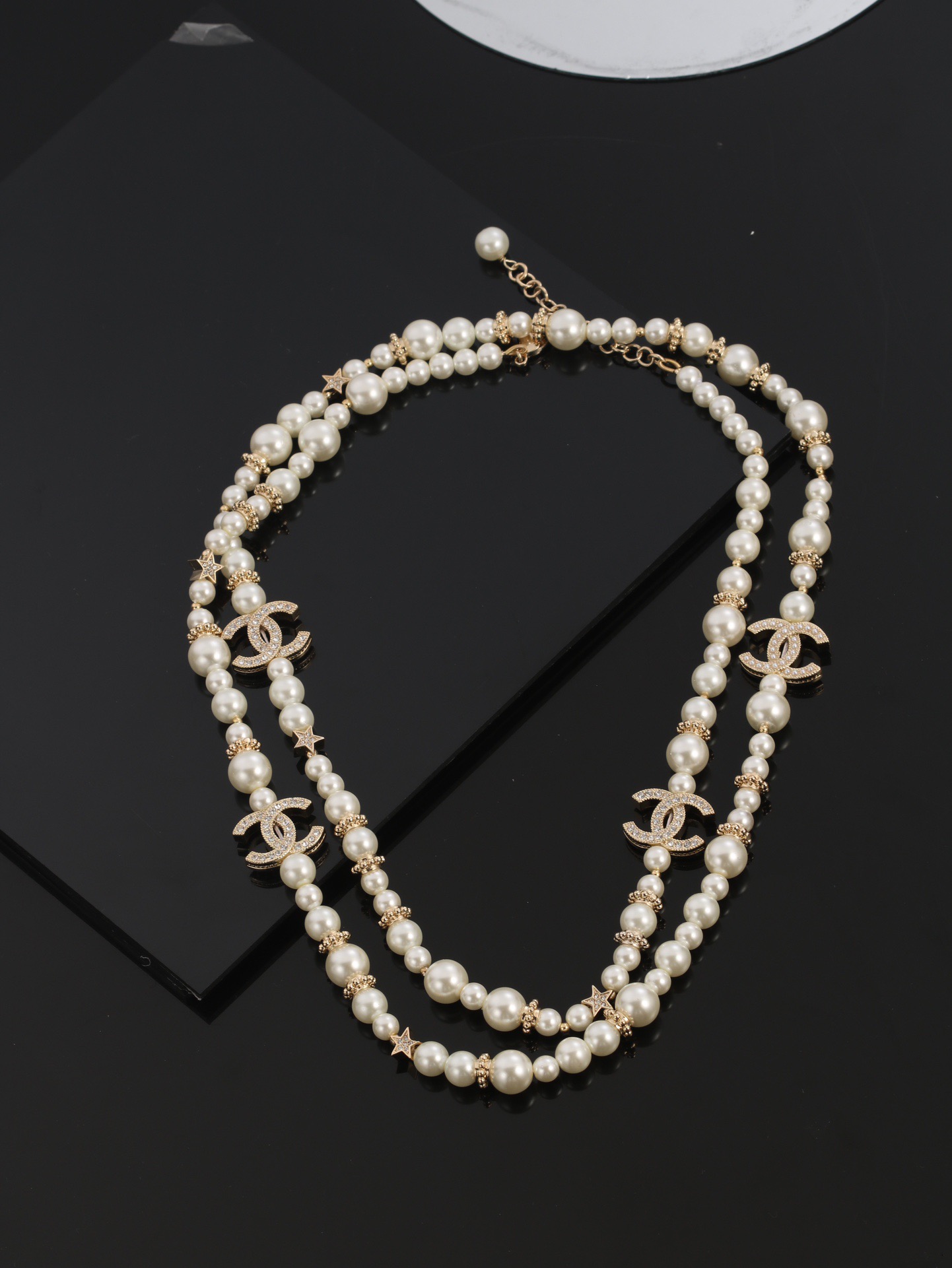 Chanel CC Logo Multi-Charm Pearl Long Necklace necklace Gold-tone metal cream white faux pearl clear crystal 80cm with 5cm extender chain