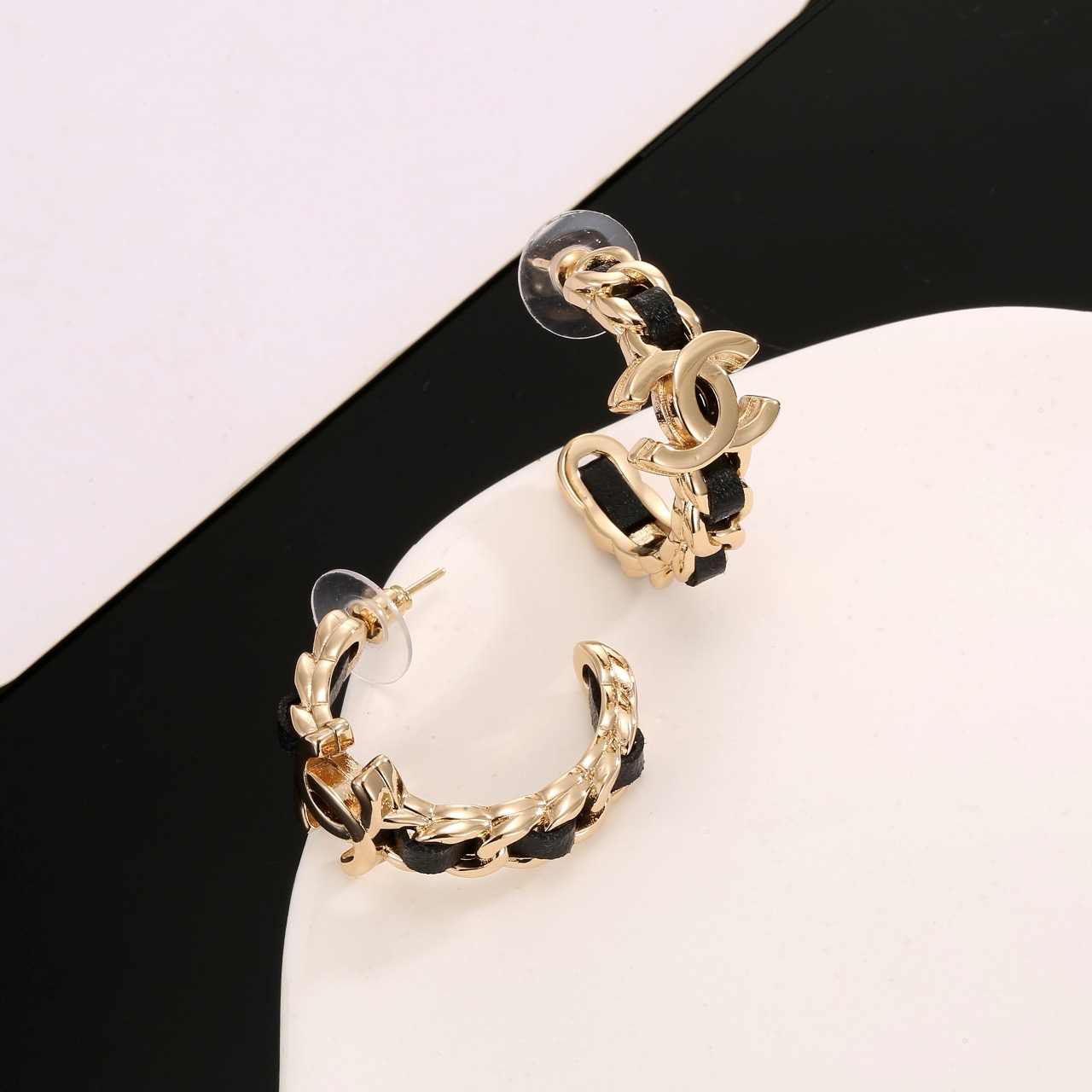 Chanel CC Interlocking Logo Leather Woven Chain Hoop Earrings earrings gold-tone metal with black leather inlay 2 5cm hoop diameter