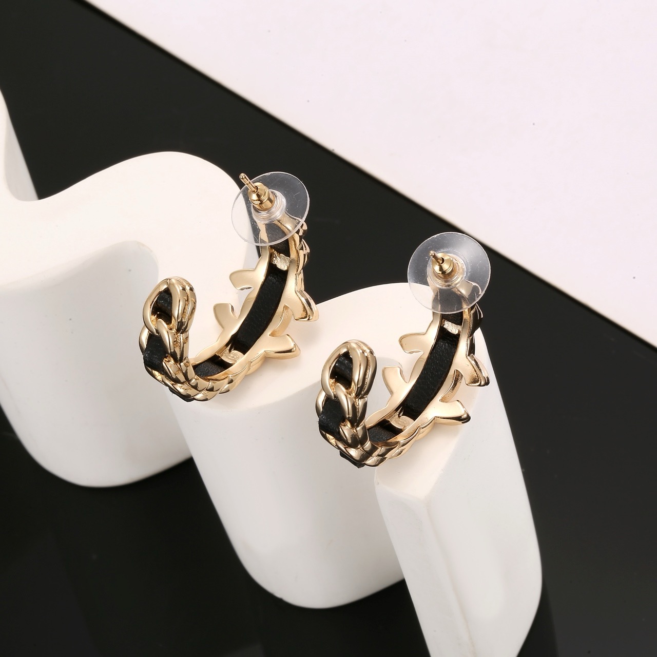 Chanel CC Interlocking Logo Leather Woven Chain Hoop Earrings earrings gold-tone metal with black leather inlay 2 5cm hoop diameter