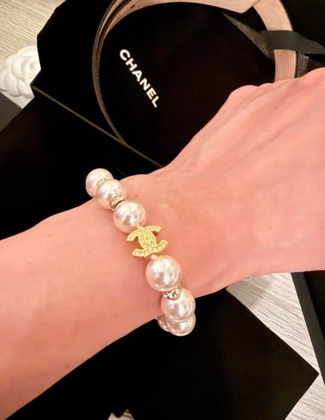 Chanel CC Pearl Crystal bracelet Gold-tone metal white faux pearl clear crystal 18cm