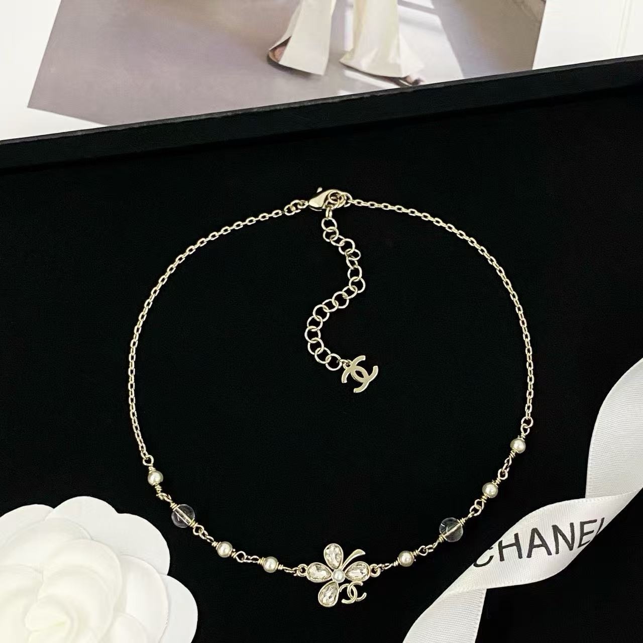 Chanel CC Clover Crystal Pearl Necklace necklace Light gold tone metal clear faceted crystal white faux pearl transparent resin bead 42cm with 5cm extender chain