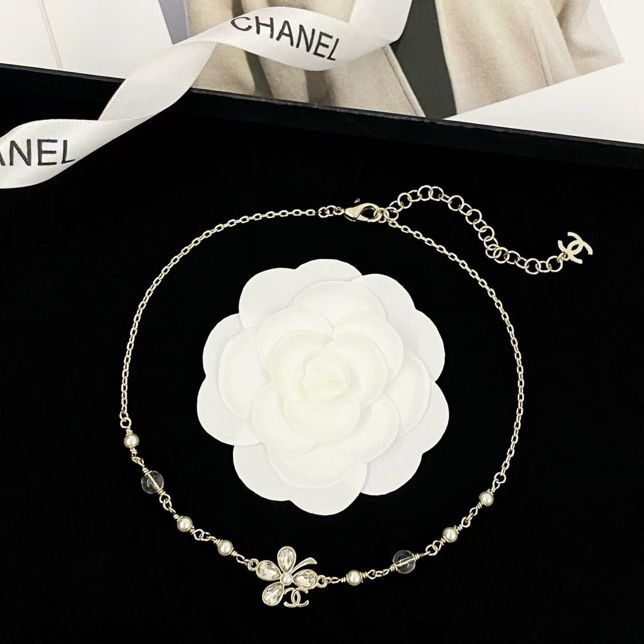 Chanel CC Clover Crystal Pearl Necklace necklace Light gold tone metal clear faceted crystal white faux pearl transparent resin bead 42cm with 5cm extender chain