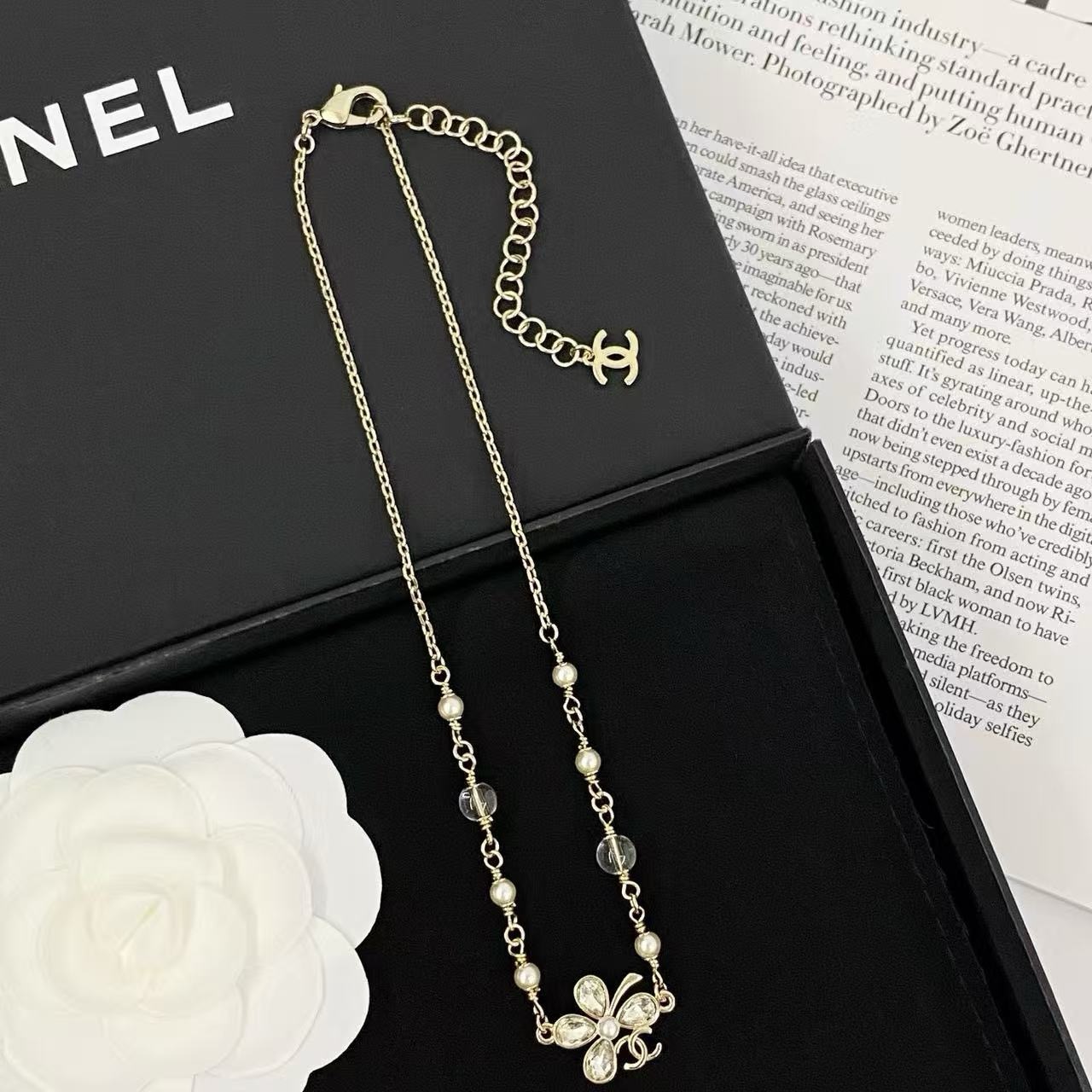 Chanel CC Clover Crystal Pearl Necklace necklace Light gold tone metal clear faceted crystal white faux pearl transparent resin bead 42cm with 5cm extender chain