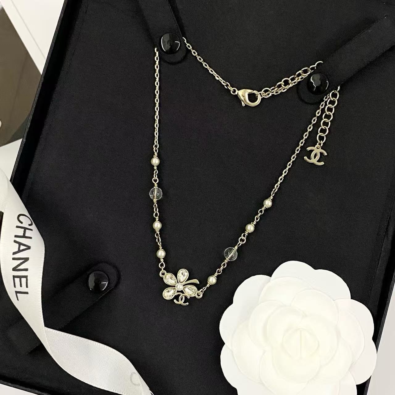 Chanel CC Clover Crystal Pearl Necklace necklace Light gold tone metal clear faceted crystal white faux pearl transparent resin bead 42cm with 5cm extender chain