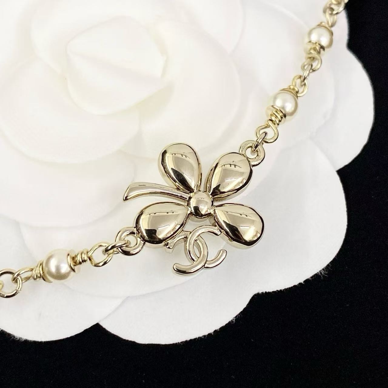 Chanel CC Clover Crystal Pearl Necklace necklace Light gold tone metal clear faceted crystal white faux pearl transparent resin bead 42cm with 5cm extender chain
