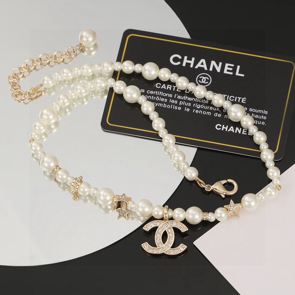 Chanel CC Logo Pearl Star Choker necklace Gold-tone metal white faux pearl clear crystal 40cm with 5cm extender chain