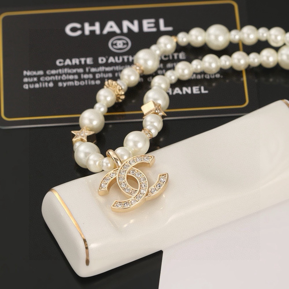 Chanel CC Logo Pearl Star Choker necklace Gold-tone metal white faux pearl clear crystal 40cm with 5cm extender chain