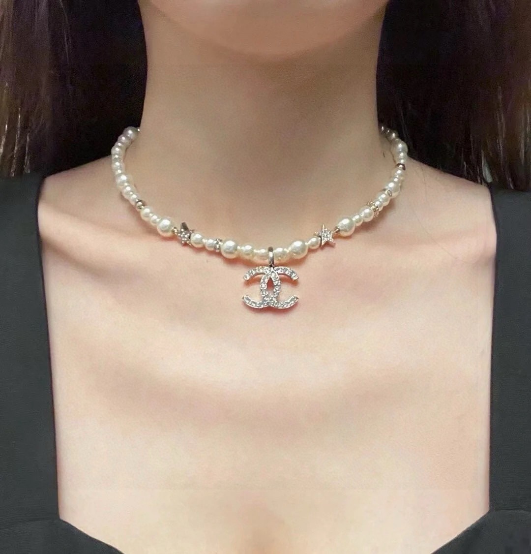 Chanel CC Logo Pearl Star Choker necklace Gold-tone metal white faux pearl clear crystal 40cm with 5cm extender chain