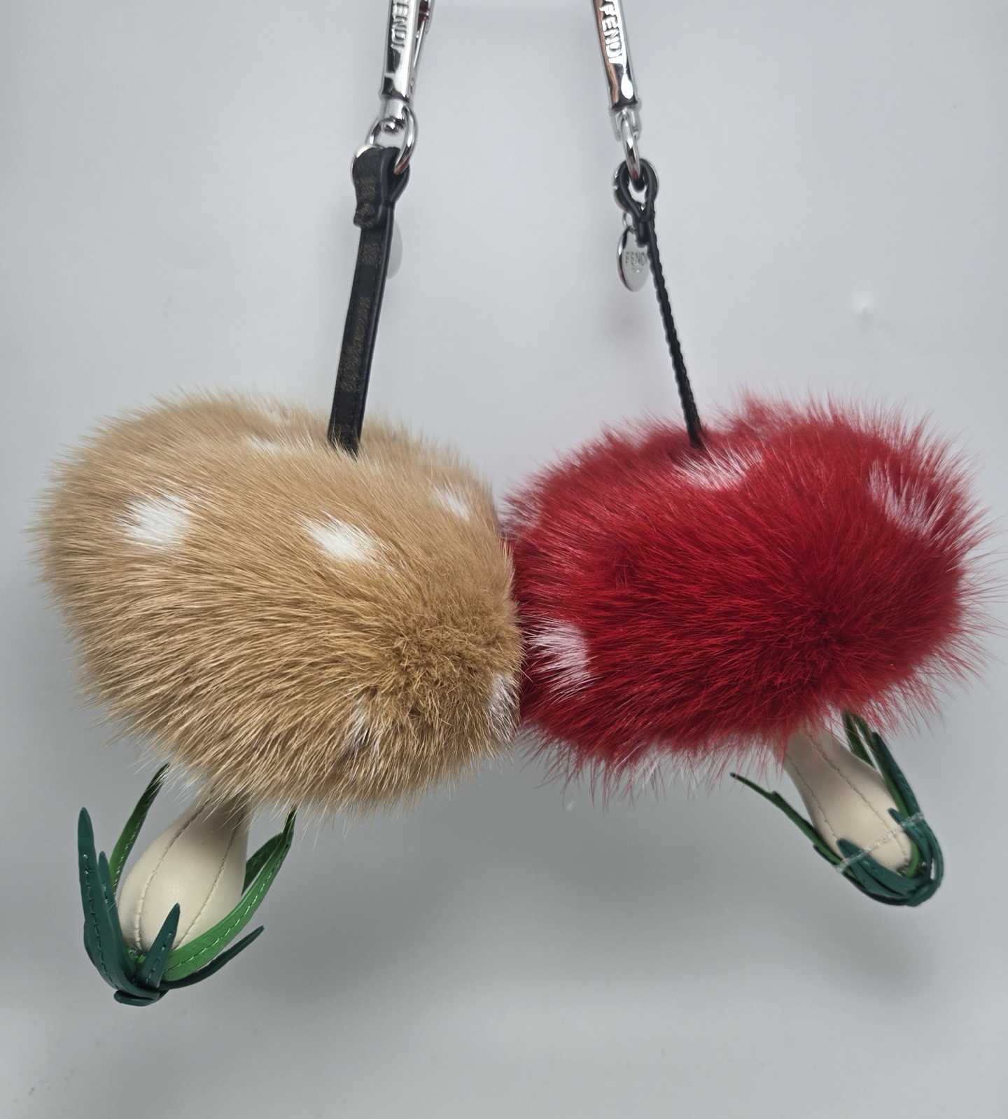 Fendi Mushroom Charm pendant Silver-tone metal brown FF coated canvas strap available in red mink fur with white spots or tan mink fur with white spots cream leather stem green leather grass detail 12cm total length