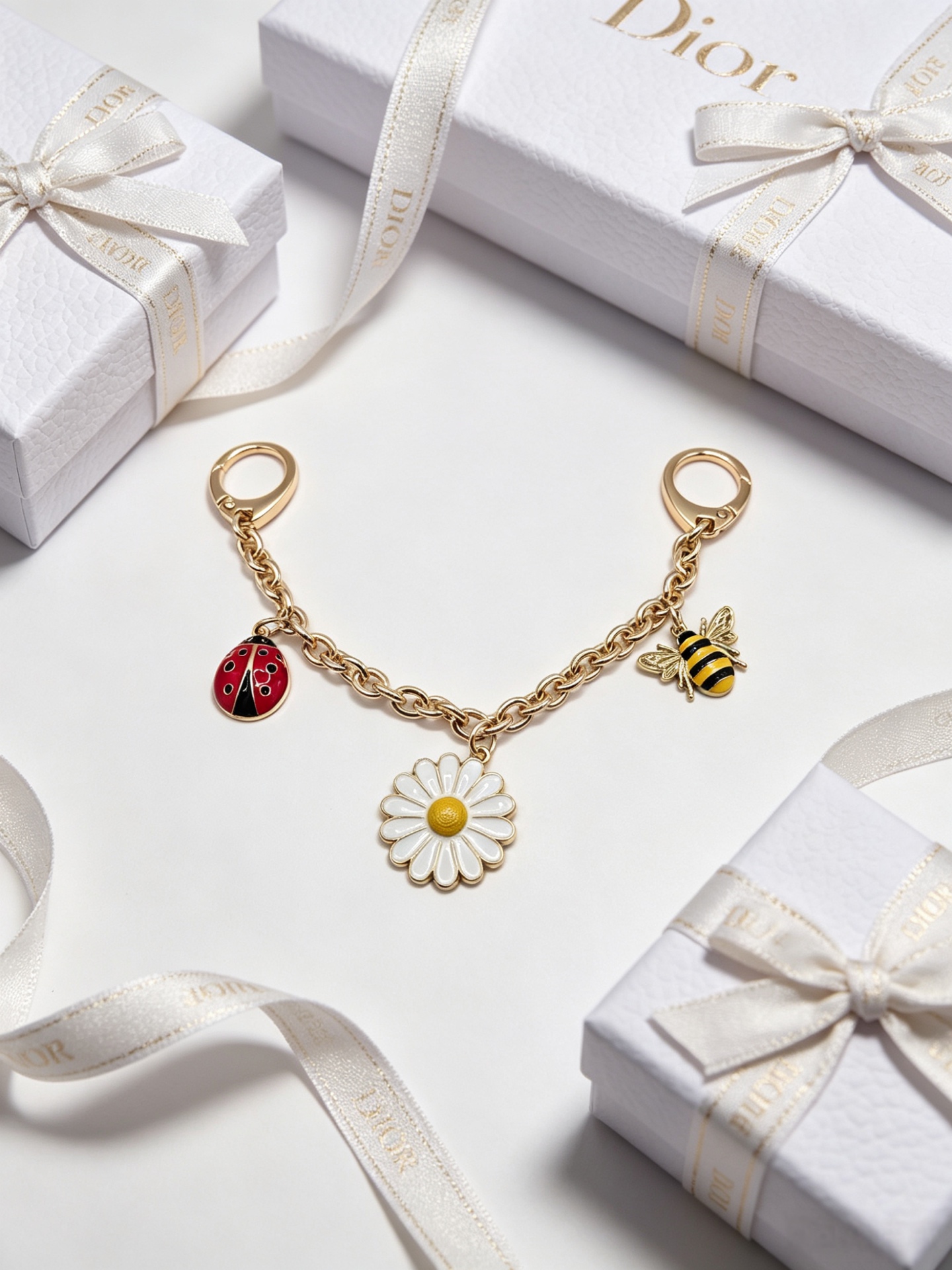Dior Dior Garden pendant Gold-tone metal with yellow red black white green enamel accents 12cm
