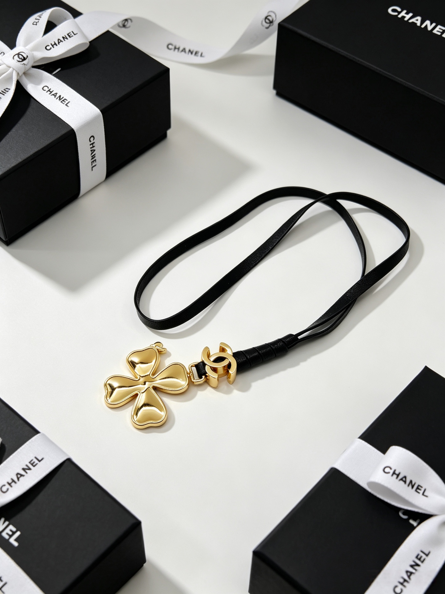 Chanel CC Clover Leather Cord Pendant Necklace necklace Gold-tone metal black leather cord 40cm