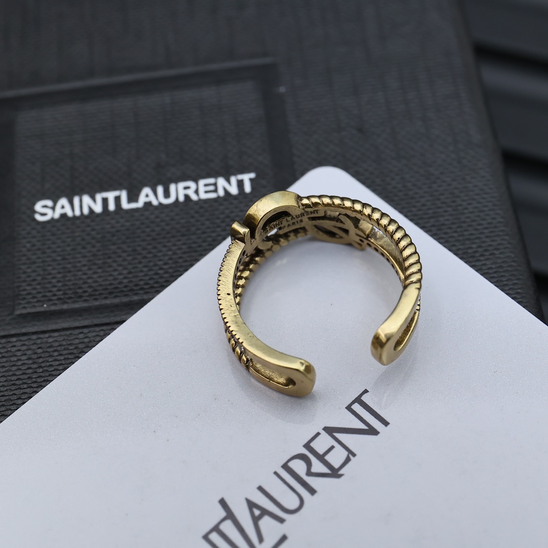 Saint Laurent Cassandre Twisted Open Ring ring antique gold-tone metal with clear crystal accents adjustable open band