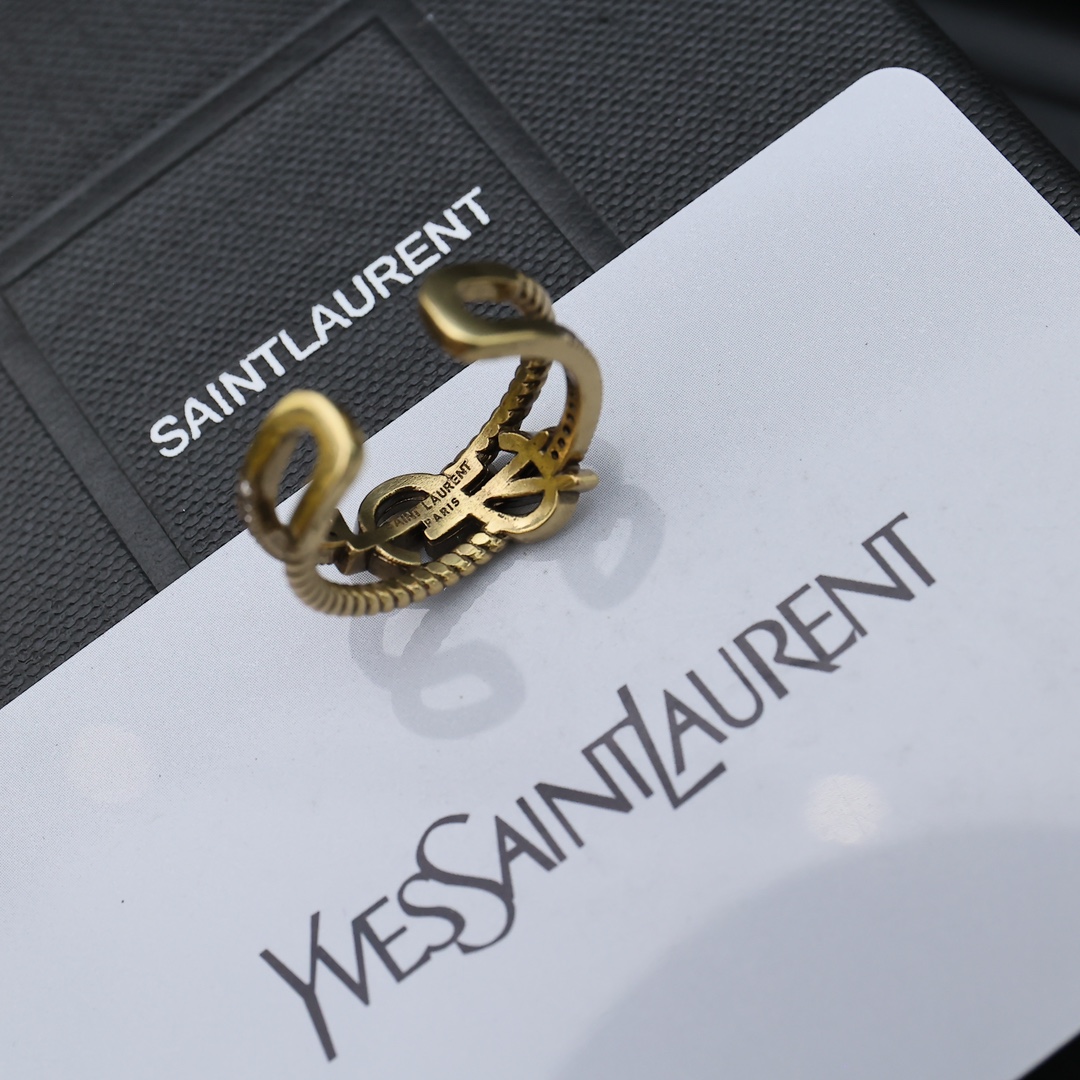 Saint Laurent Cassandre Twisted Open Ring ring antique gold-tone metal with clear crystal accents adjustable open band