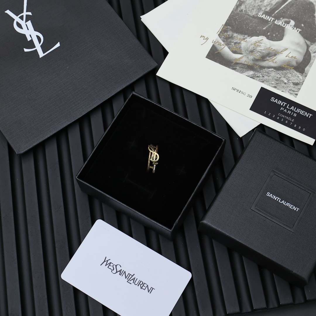 Saint Laurent Cassandre Twisted Open Ring ring antique gold-tone metal with clear crystal accents adjustable open band