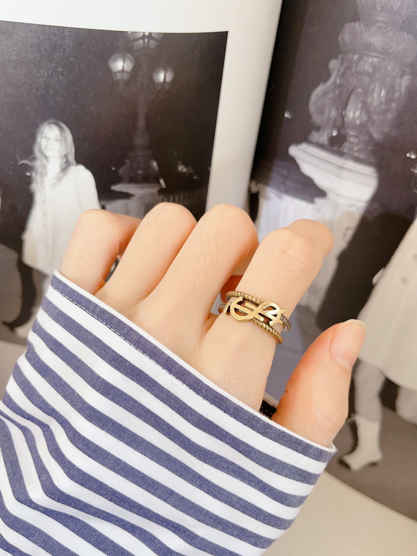 Saint Laurent Cassandre Twisted Open Ring ring antique gold-tone metal with clear crystal accents adjustable open band