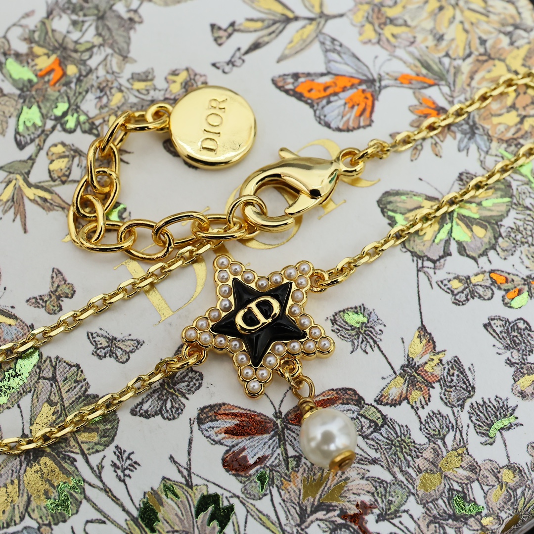 Dior Cruise CD Star Pearl Bracelet bracelet gold-tone metal black enamel white faux pearl clear crystal accents 17cm with 3cm extender