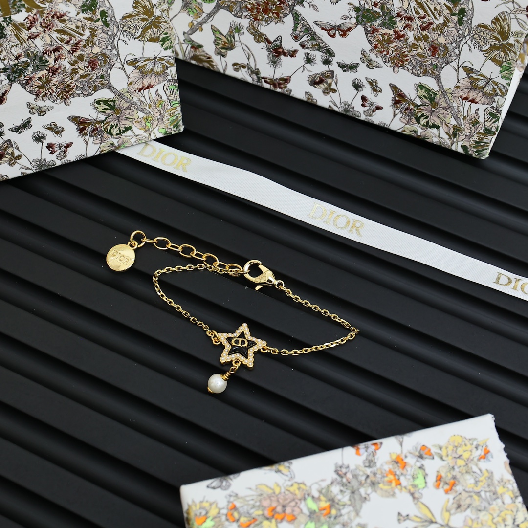 Dior Cruise CD Star Pearl Bracelet bracelet gold-tone metal black enamel white faux pearl clear crystal accents 17cm with 3cm extender