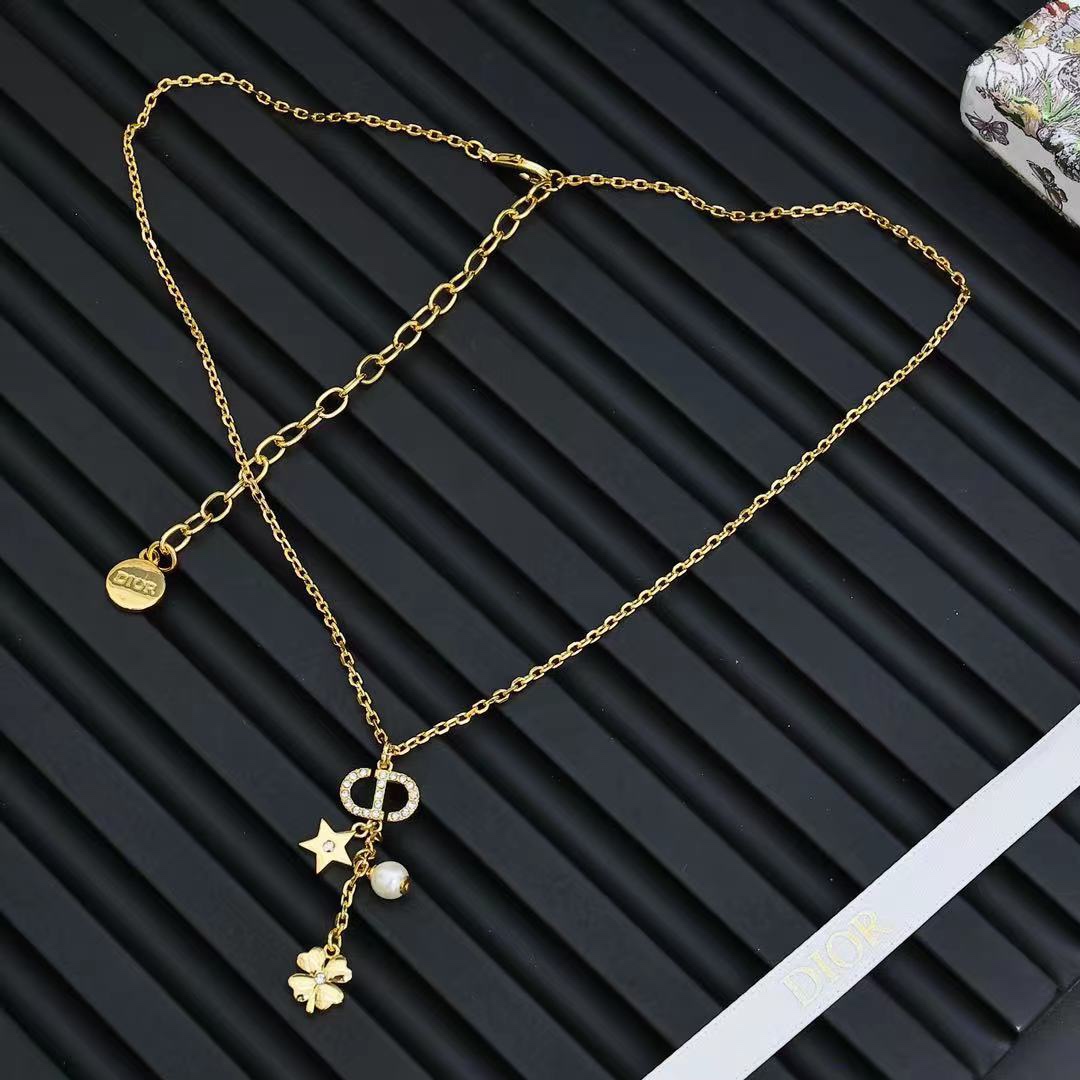 Dior Petit CD Lucky Charms Necklace necklace gold-tone metal with clear crystals white pearl and gold-toned star clover charms 42cm with 5cm extender chain