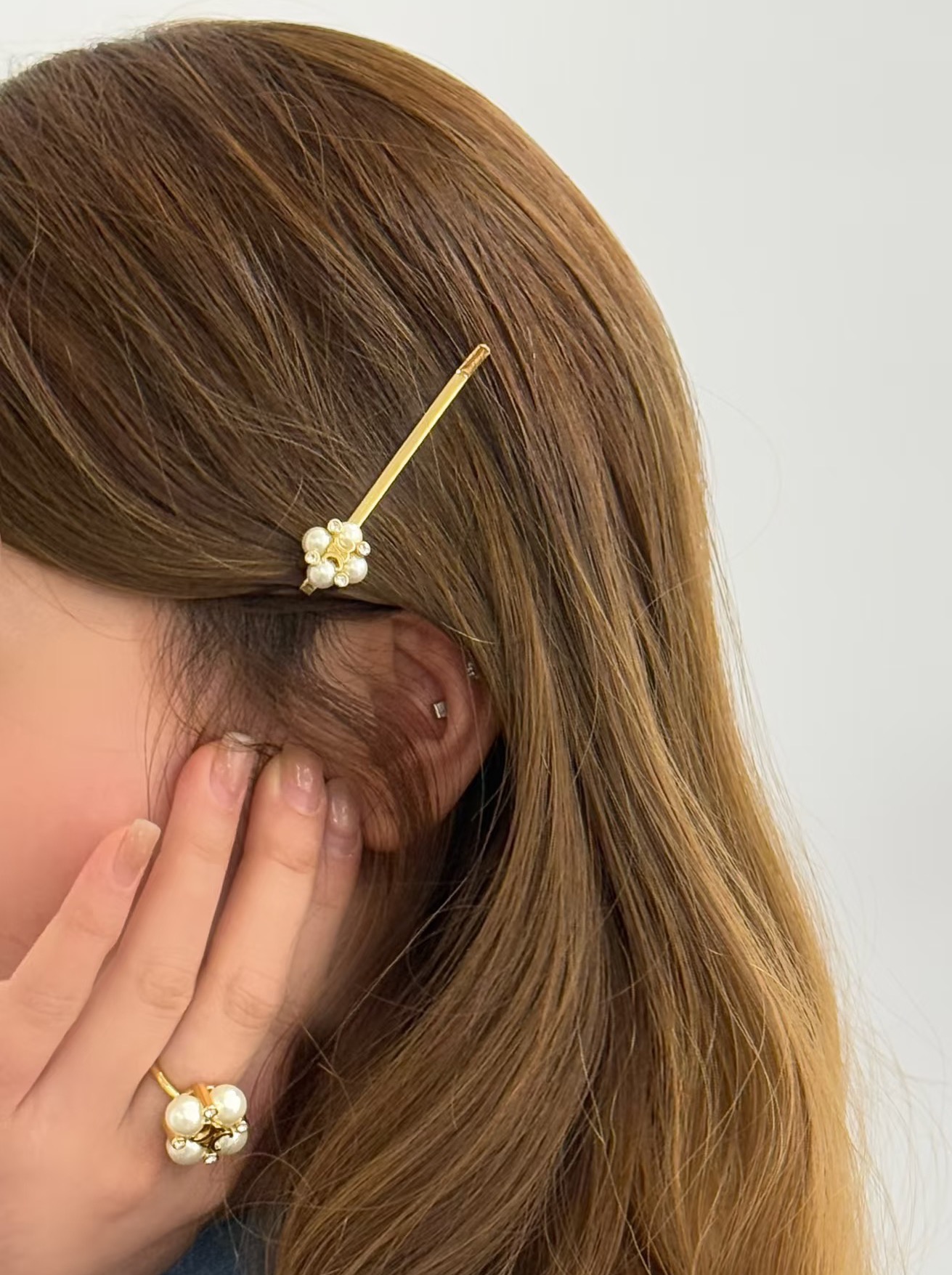 Celine Arc de Triomphe Pearl Flower brooch gold-tone metal with white pearls and clear crystal accents 6cm