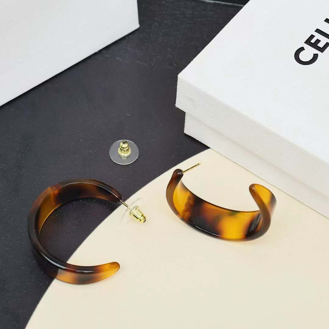 Celine Triomphe Acrylic Hoop Earrings earrings gold-tone metal with tortoiseshell brown amber acrylic 3 5cm hoop diameter
