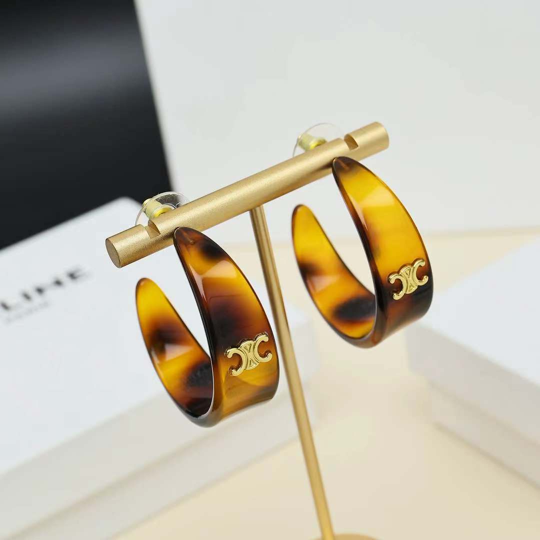 Celine Triomphe Acrylic Hoop Earrings earrings gold-tone metal with tortoiseshell brown amber acrylic 3 5cm hoop diameter