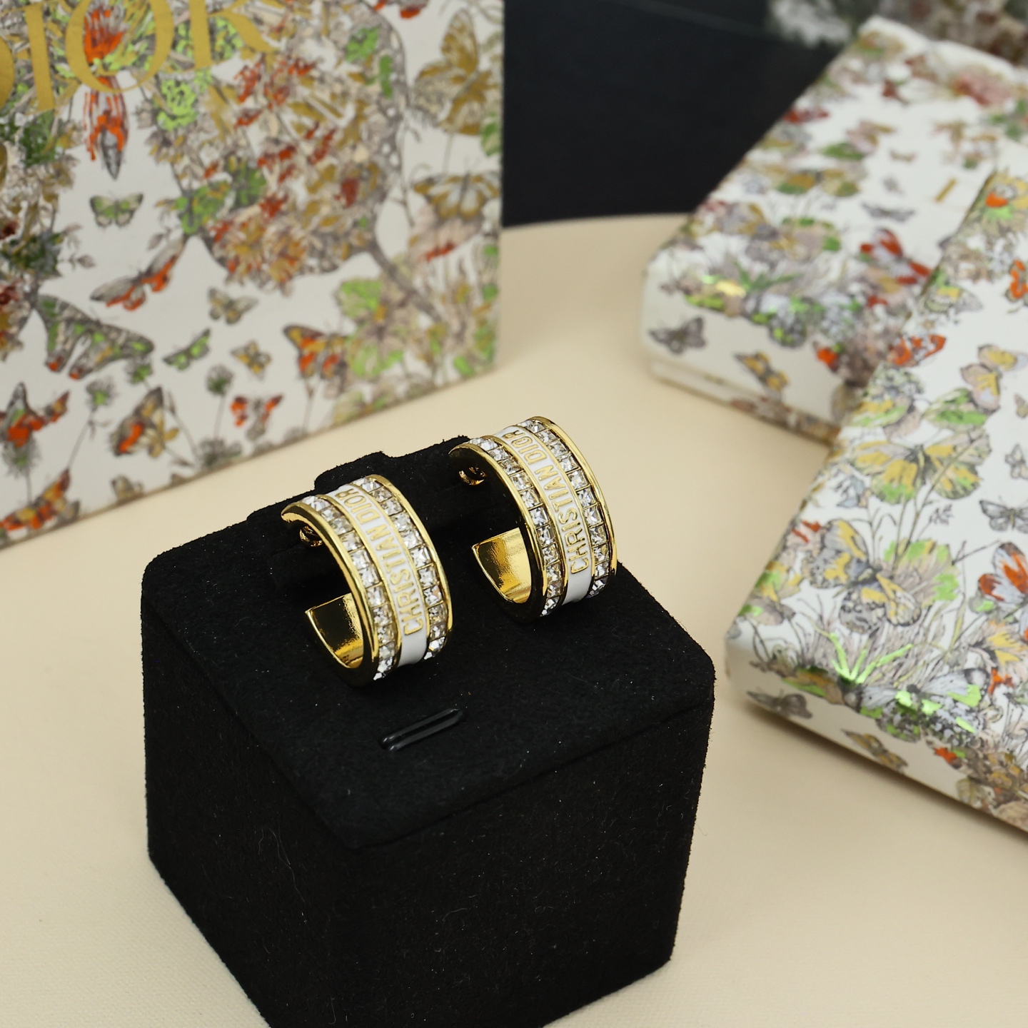 Dior Christian Dior Code Hoop Earrings earrings Gold-tone metal with clear crystal accents available in white enamel and black enamel variants 1 5cm outer diameter