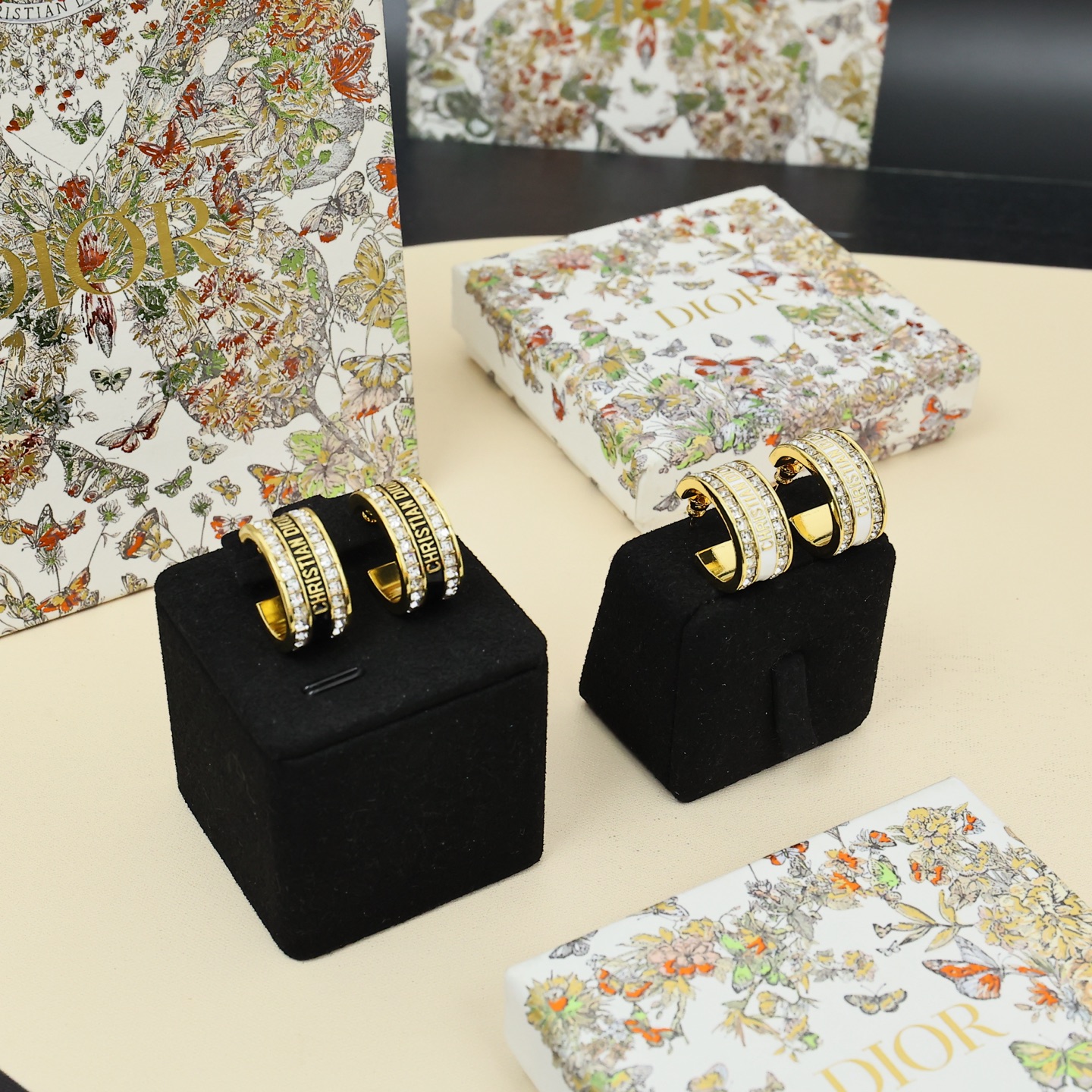 Dior Christian Dior Code Hoop Earrings earrings Gold-tone metal with clear crystal accents available in white enamel and black enamel variants 1 5cm outer diameter
