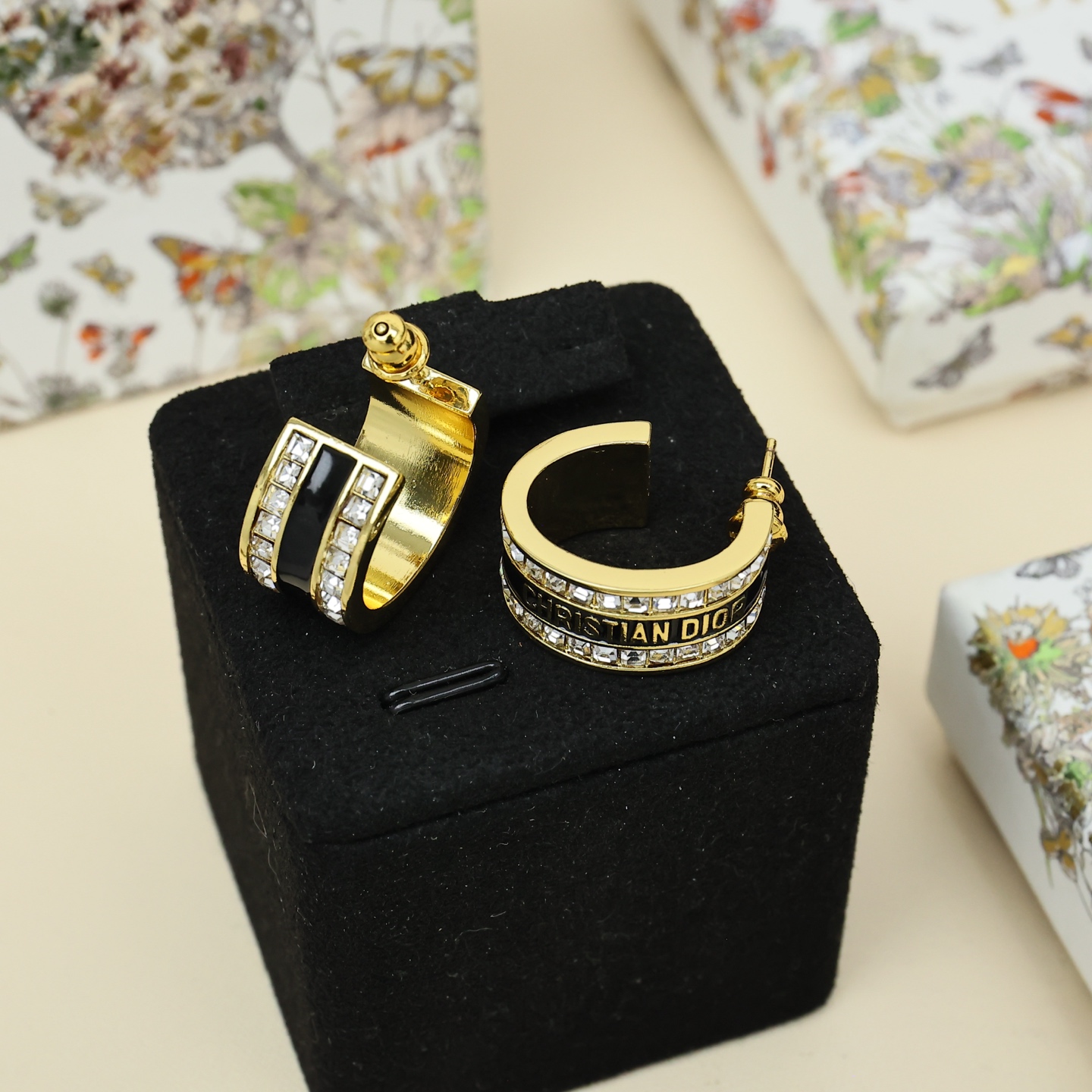 Dior Christian Dior Code Hoop Earrings earrings Gold-tone metal with clear crystal accents available in white enamel and black enamel variants 1 5cm outer diameter
