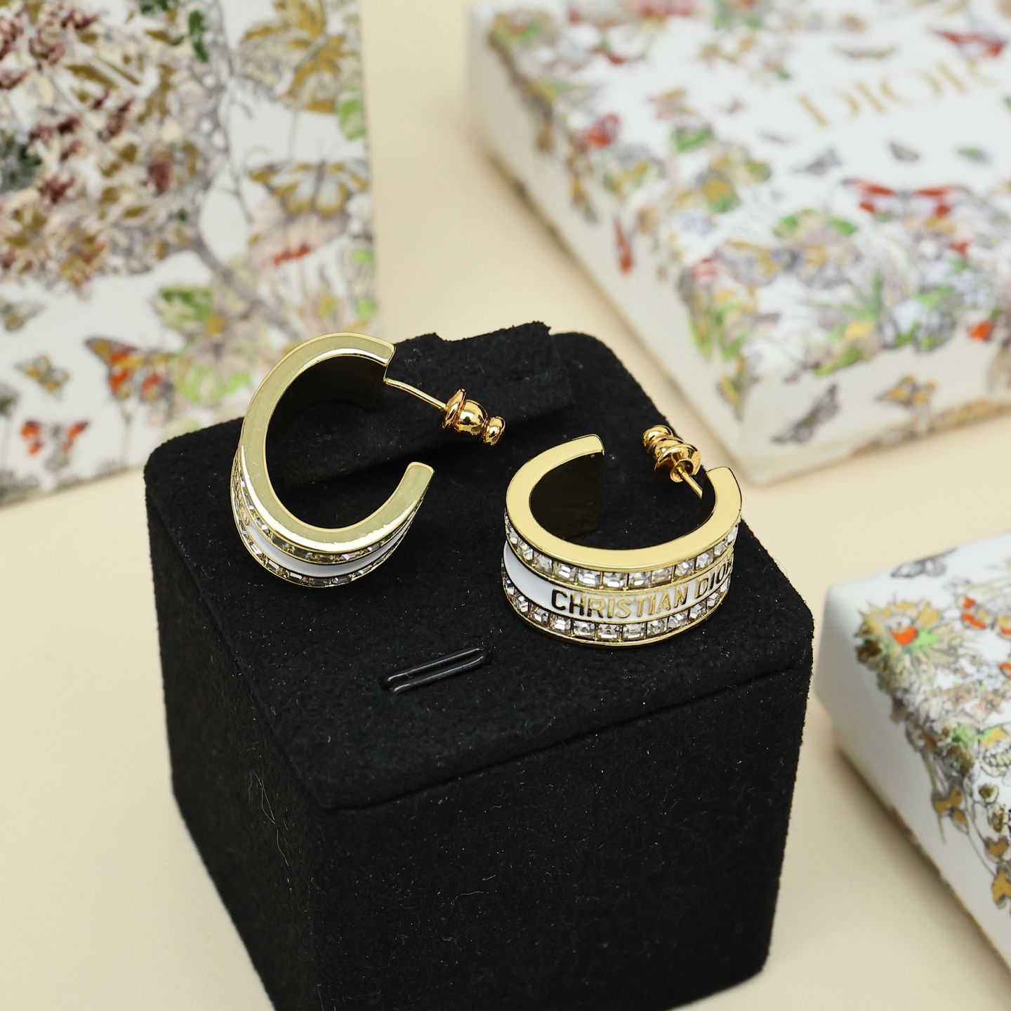 Dior Christian Dior Code Hoop Earrings earrings Gold-tone metal with clear crystal accents available in white enamel and black enamel variants 1 5cm outer diameter
