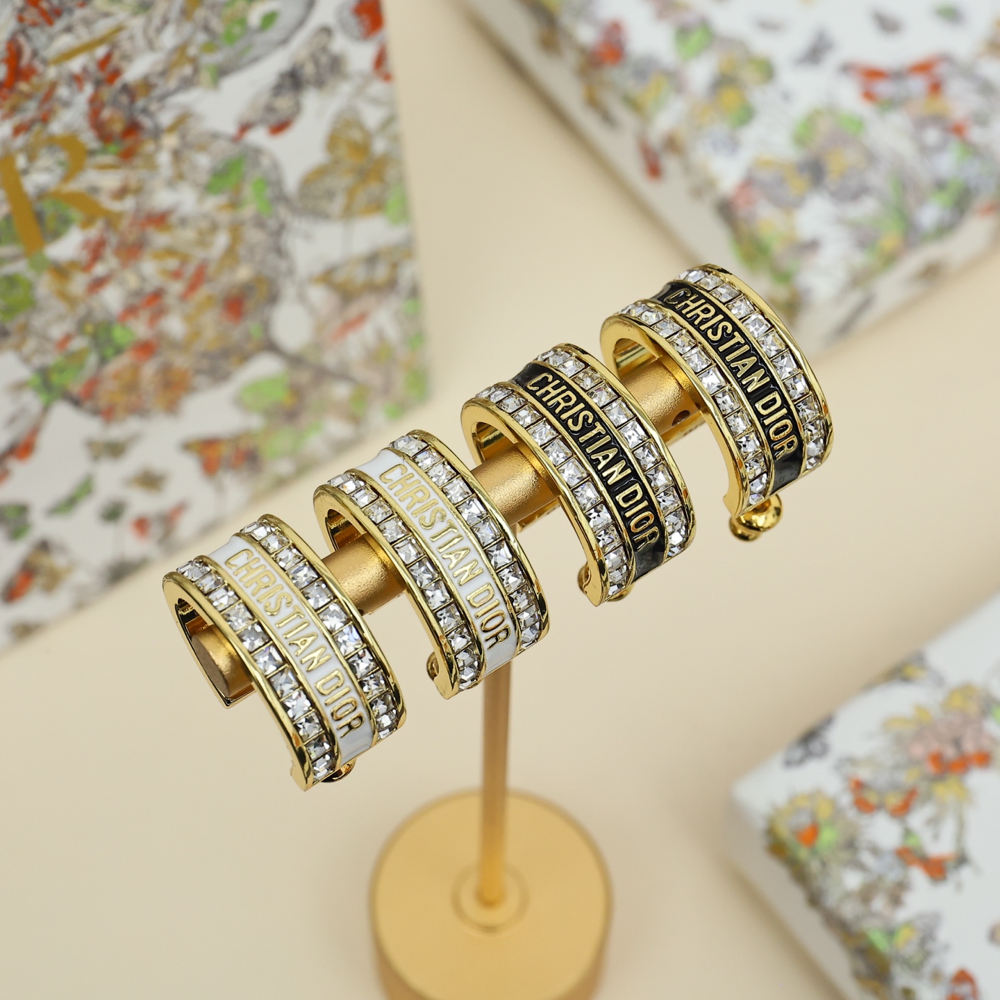 Dior Christian Dior Code Hoop Earrings earrings Gold-tone metal with clear crystal accents available in white enamel and black enamel variants 1 5cm outer diameter