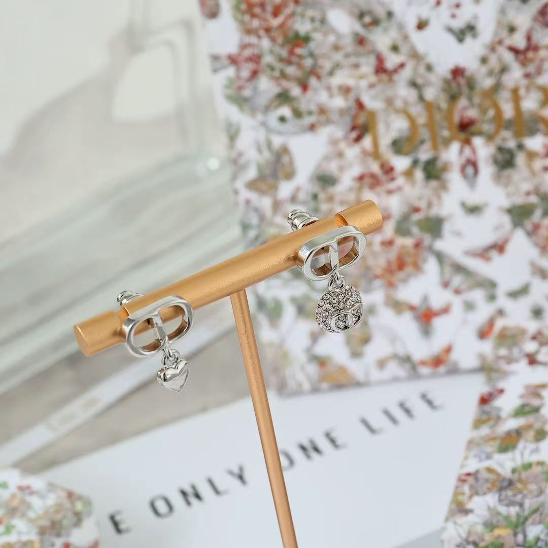 Dior CD Heart Crystal Drop Earrings earrings Silver-tone metal with silver heart charm and clear crystals Gold-tone metal with gold heart charm and clear crystals One Size drop length approx 1 5cm