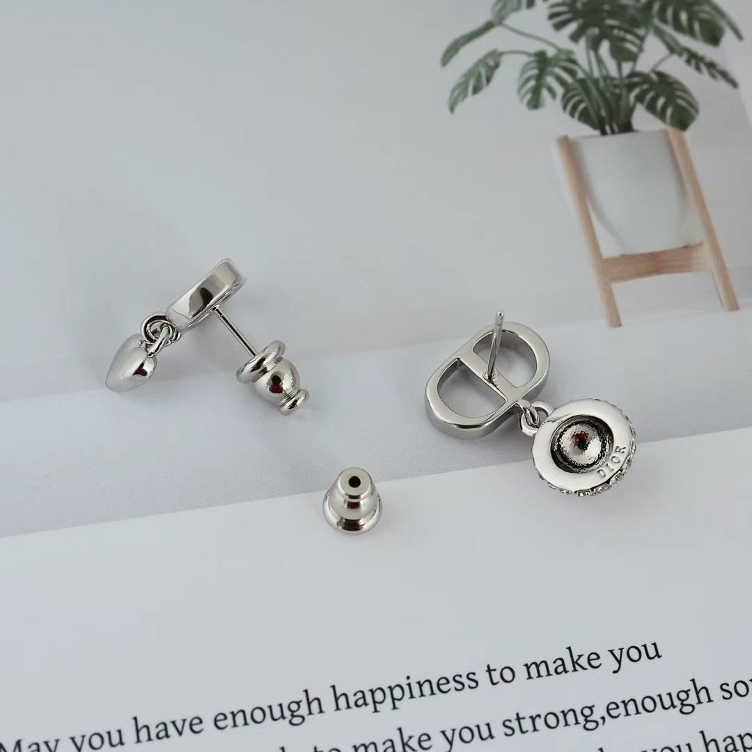 Dior CD Heart Crystal Drop Earrings earrings Silver-tone metal with silver heart charm and clear crystals Gold-tone metal with gold heart charm and clear crystals One Size drop length approx 1 5cm