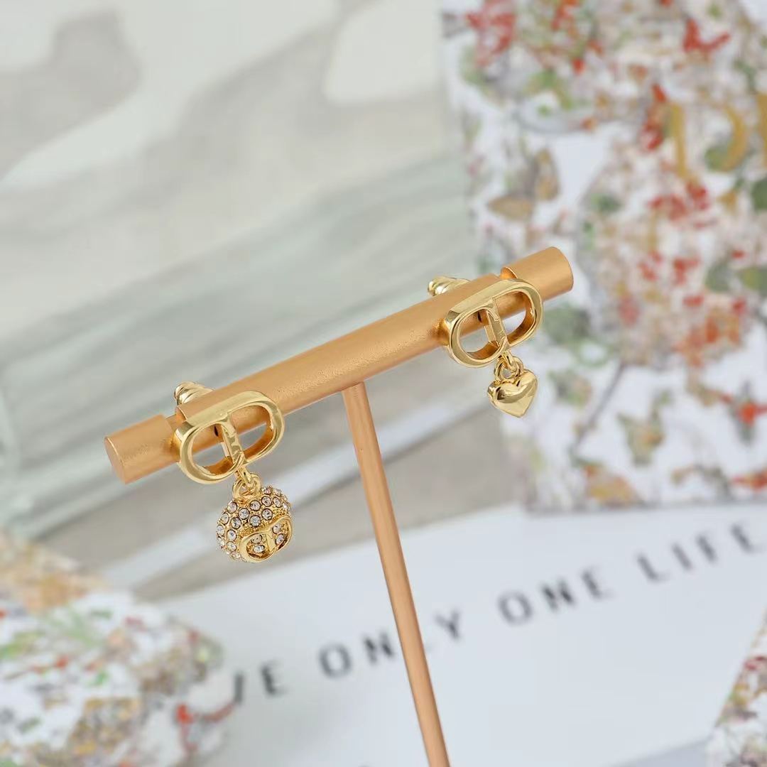 Dior CD Heart Crystal Drop Earrings earrings Silver-tone metal with silver heart charm and clear crystals Gold-tone metal with gold heart charm and clear crystals One Size drop length approx 1 5cm