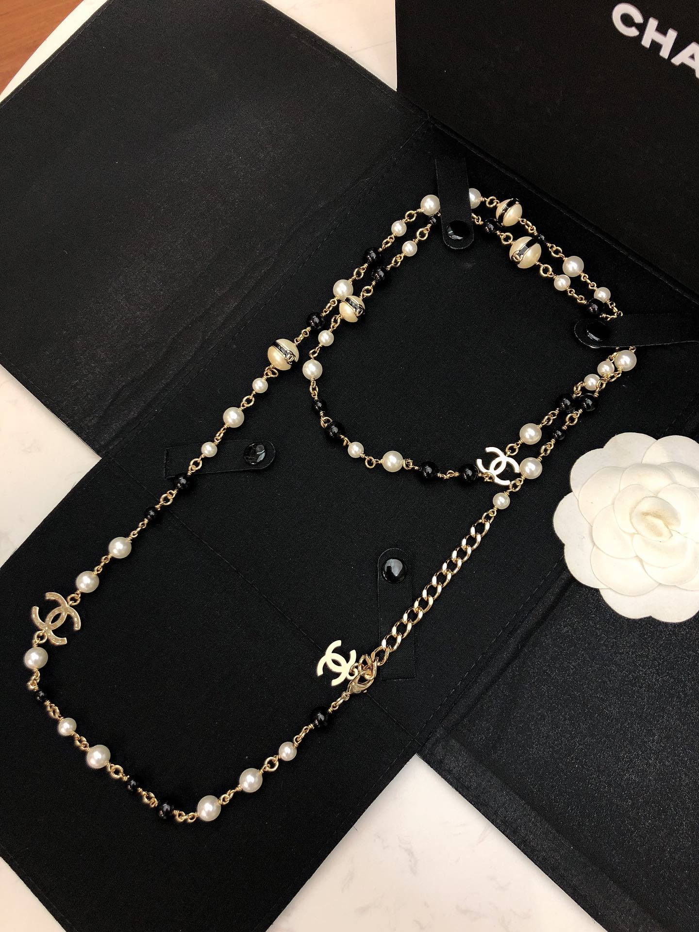 Chanel CC Logo Pearl Bead Long Necklace necklace Gold-tone metal white faux pearl black resin bead 80cm