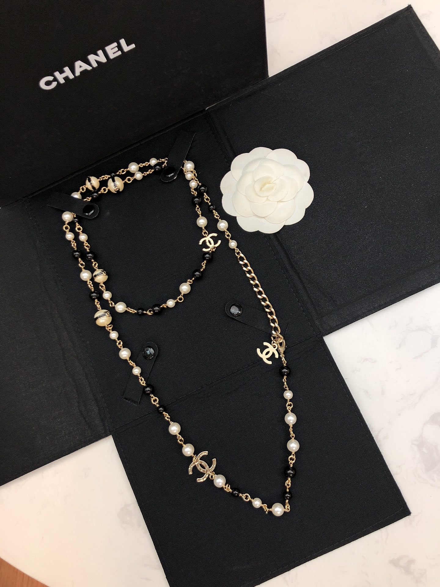 Chanel CC Logo Pearl Bead Long Necklace necklace Gold-tone metal white faux pearl black resin bead 80cm