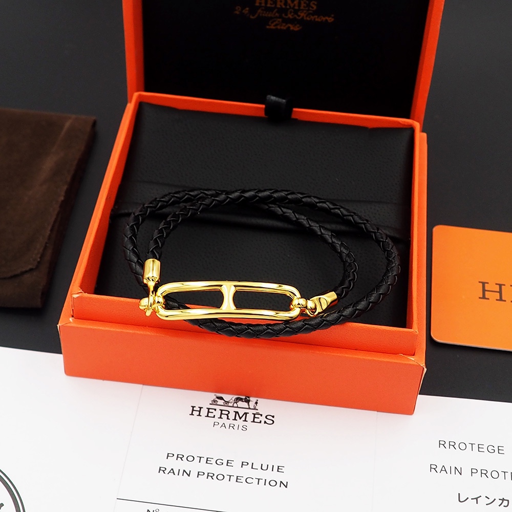 Bracciale Hermes Roulis in pelle intrecciata nera con hardware in metallo placcato oro 40 cm doppio giro