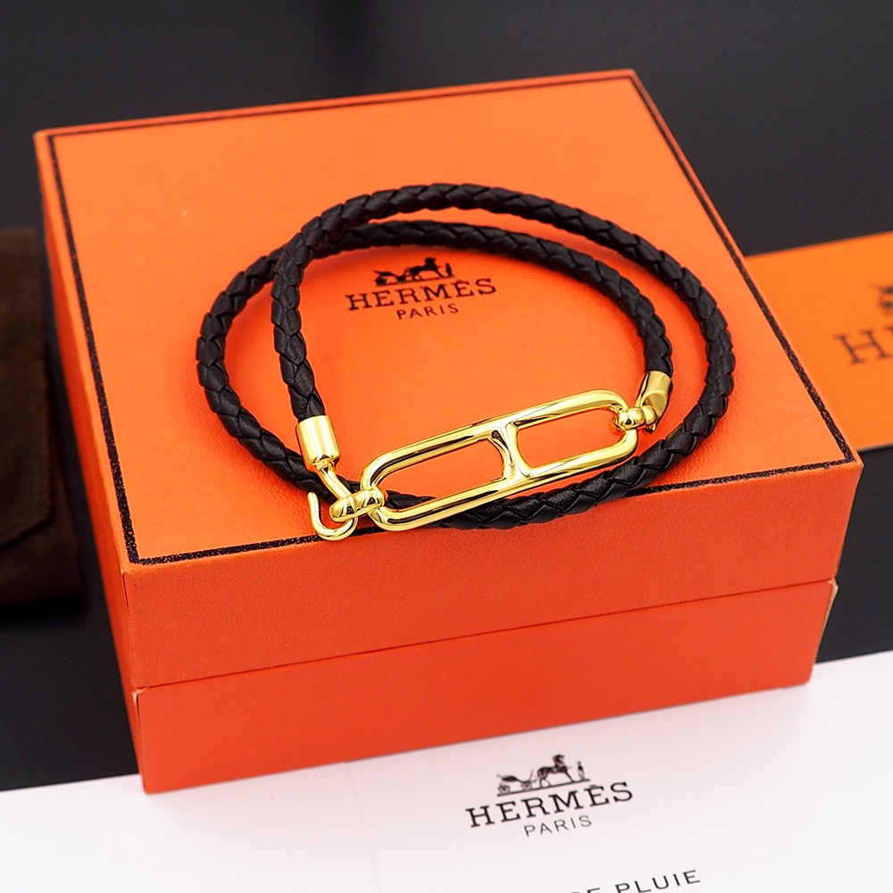 Bracciale Hermes Roulis in pelle intrecciata nera con hardware in metallo placcato oro 40 cm doppio giro